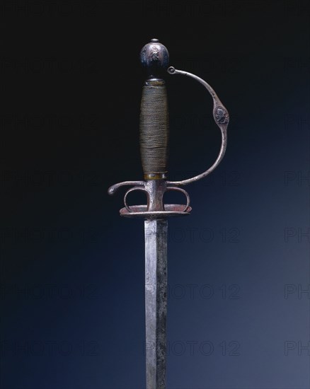 Small Sword, c. 1650-1670. France, 17th century. Steel, iron, silver inlay; wood and brass wire; overall: 90.8 cm (35 3/4 in.); blade: 74.1 cm (29 3/16 in.); guard: 6.7 cm (2 5/8 in.).