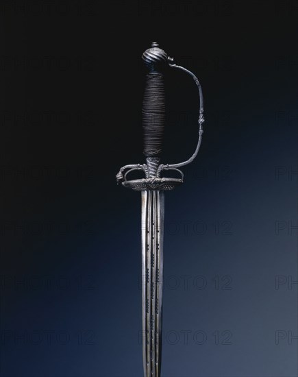 Small Sword, c. 1720-1760. England, 18th century. Steel; piercing; perforation; overall: 97 cm (38 3/16 in.); blade: 80.5 cm (31 11/16 in.); grip: 12.6 cm (4 15/16 in.); guard: 7.7 cm (3 1/16 in.).