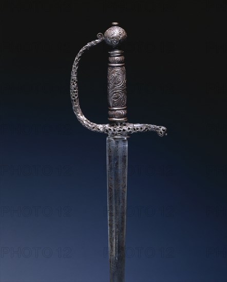 Small Sword, c. 1650. England, 17th century. Steel, pierced, chiseled, and engraved; overall: 93.5 cm (36 13/16 in.); blade: 79.7 cm (31 3/8 in.); grip: 11.8 cm (4 5/8 in.); guard: 12 cm (4 3/4 in.).