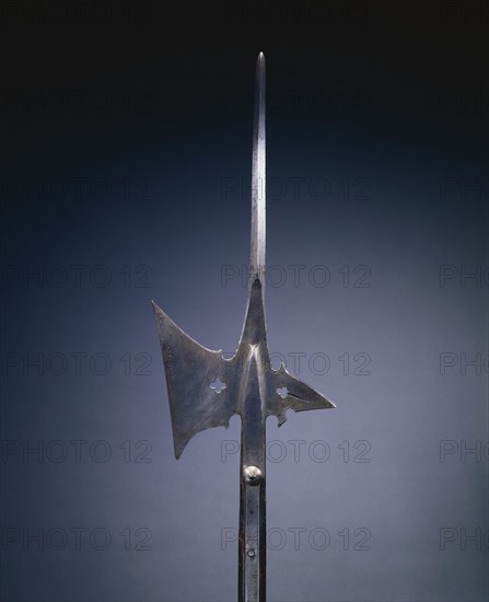 Halberd, c. 1520. Germany, 16th century. Steel, pierced quatrefoil; rectangular wood haft with planed corners; overall: 182.3 cm (71 3/4 in.); blade: 24.2 cm (9 1/2 in.).