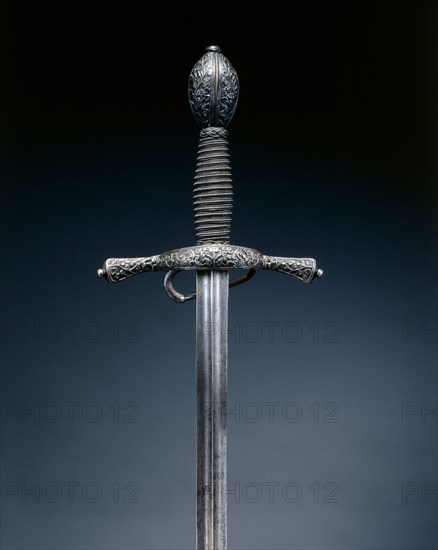 Rapier, c. 1600. Italy, early 17th Century. Steel, wire grip; hilt blued and chiseled with foliate pattern; overall: 110 cm (43 5/16 in.); blade: 94 cm (37 in.); quillions: 16.2 cm (6 3/8 in.); grip: 14.7 cm (5 13/16 in.)