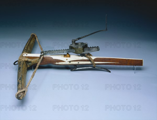 Crossbow, c. 1460-1470. Germany, 15th century. Wood (walnut?) inlaid with bone; horn; iron and steel; composite bow (horn and parchment); overall: 87 cm (34 1/4 in.); bow: 74.5 cm (29 5/16 in.); butt: 4.2 cm (1 5/8 in.).