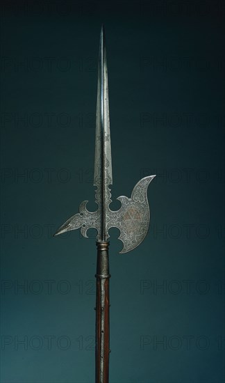 Parade Halberd (from the state guard of Elector Christian I of Saxony [ 1560- 91]), 1586-1591. Germany, Saxony, late 16th Century. Steel, gilt and etched; round wood haft; overall: 238.2 cm (93 3/4 in.); blade: 30.5 cm (12 in.).