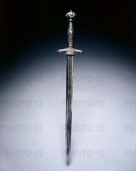 Dagger, early 1600s. Italy, early 17th century. Steel, perforated blade; openwork grip; overall: 46 cm (18 1/8 in.); blade: 32.1 cm (12 5/8 in.); quillions: 8.8 cm (3 7/16 in.); grip: 11 cm (4 5/16 in.).
