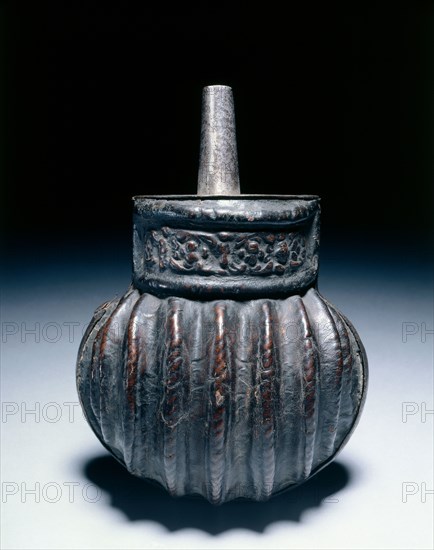 Powder Flask, 1500s(?). Italy, late 16th century (?) questionable authenticity. Leather (cuir bouilli); modern steel mounts and fitting; overall: 17.2 x 13.5 cm (6 3/4 x 5 5/16 in.)