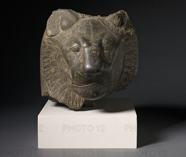 Head of Sekhmet, c. 1391-1353 BC. Egypt, Presumably Thebes, New Kingdom, Dynasty 18, reign of Amenhotep III, 1391-1353 BC. Granodiorite; overall: 33.4 x 31.5 x 32 cm (13 1/8 x 12 3/8 x 12 5/8 in.).