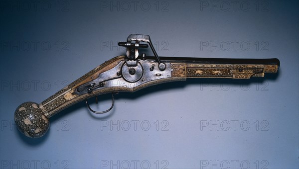 Wheel-Lock Hunting Pistol, 1578. South Germany, 16th century. Steel, walnut stock with engraved stag horn; ball butt; overall: 54.6 cm (21 1/2 in.); barrel: 31.8 cm (12 1/2 in.); bore: 1.4 cm (9/16 in.).