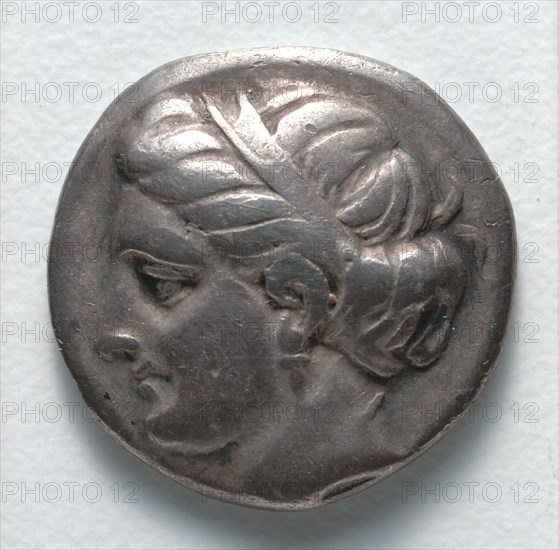Drachma: Female Head (obverse), c. 369-336 BC. Greece, 4th century BC. Silver; diameter: 1.8 cm (11/16 in.).