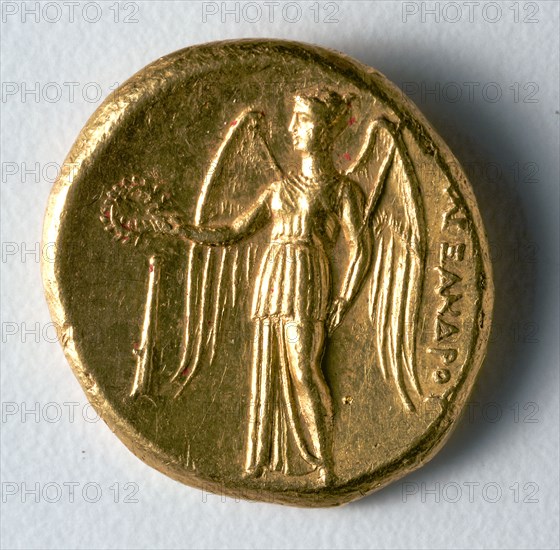 Stater: Winged Nike Holding a Wreath and Standard (reverse), 336-323 BC. Greece, Macedonia, 4th century BC. Gold; diameter: 1.9 cm (3/4 in.).