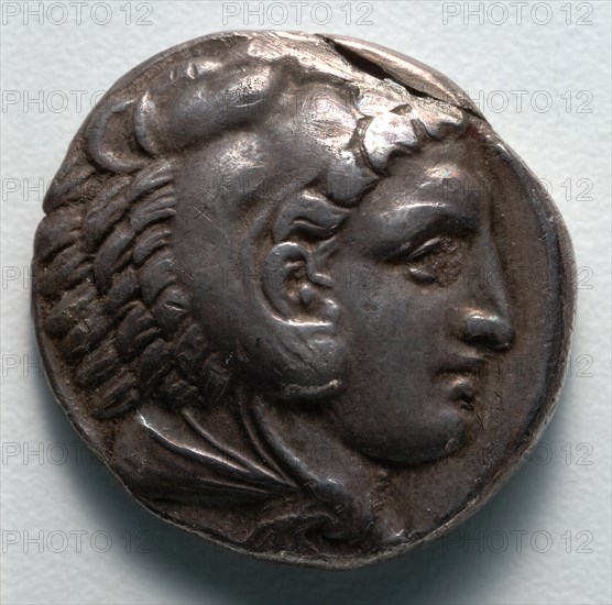 Tetradrachm: Head of Young Herakles in Lion Skin (obverse), 336-323 BC. Greece, Macedonia, Alexander the Great. Silver; diameter: 2.6 cm (1 in.).