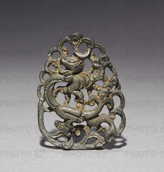 Ornament with Lotus and Mandarin Duck Design, 1100s. Korea, Goryeo period (918-1392). Bronze; overall: 3.4 x 2.5 cm (1 5/16 x 1 in.).
