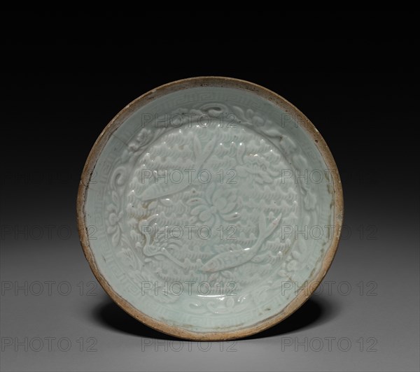 Saucer: Qingbai ware, 13th-14th Century. China, Southern Song Dynasty (1127-1279) - Yuan Dynasty (1271-1368). Porcelain; diameter: 14 cm (5 1/2 in.).
