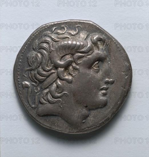 Tetradrachm: Alexander the Great (obverse), 323-281 BC. Greece, 4th century BC. Silver; diameter: 0.6 cm (1/4 in.).