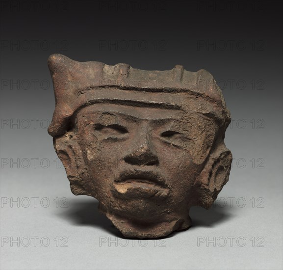 Head, 600-1000. Mexico, 600-1000. Terracotta; overall: 8 x 8 x 3.8 cm (3 1/8 x 3 1/8 x 1 1/2 in.).