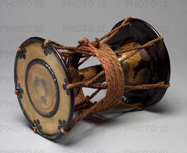 Tsuzumi Drum, 1800s. Japan, Edo (1615-1868) - Meiji (1868-1912) periods. Wood with lacquer and sprinkled gold powder (maki-e), hide, iron, and cord; diameter: 20.4 cm (8 1/16 in.); overall: 25.4 cm (10 in.).