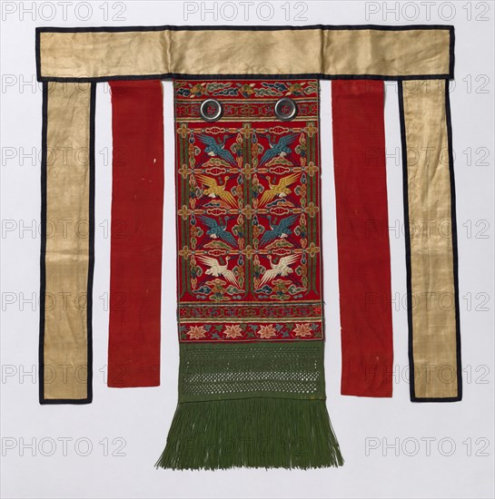 Back Apron for the Royal Ceremonial Robe, late 1800s-early 1900s. Korea, Joseon dynasty (1392-1910). Red pile weave, wool or silk, embroidered with silk (polychromatic); red silk, gauze weave; white silk, gauze weave; green silk fringe; metal ring embellishments; overall: 73 x 69.2 cm (28 3/4 x 27 1/4 in.)