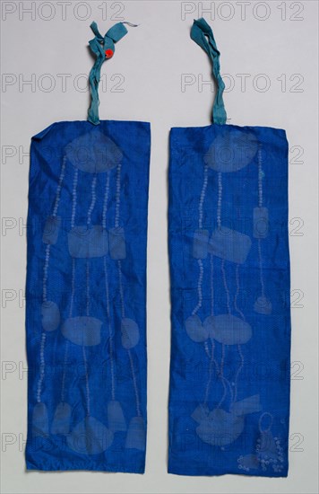 Jade String Pendant (left) for the Royal Ceremonial Costume, late 1800s-early 1900s. Blue silk, gauze weave and plain weave; jade and beads (2 sizes)