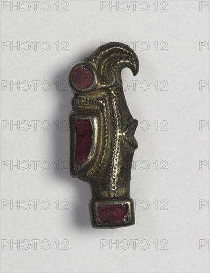 Eagle-Shaped Fibula, 500s. Frankish, Migration period, 6th century. Bronze with traces of gilding and silver, and garnets; overall: 2.9 x 1.3 x 0.8 cm (1 1/8 x 1/2 x 5/16 in.).
