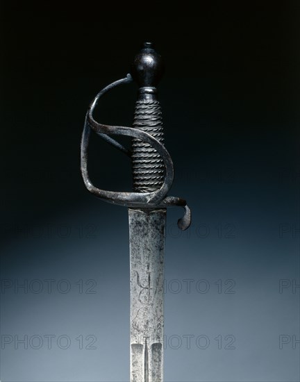Cavalry Sword, c. 1700-1730. Germany, Saxony, 18th century. Steel (vestiges of blueing and gilding on hilt); wire grip; overall: 105 cm (41 5/16 in.); blade: 105 cm (41 5/16 in.); grip: 14.5 cm (5 11/16 in.); guard: 11 cm (4 5/16 in.).