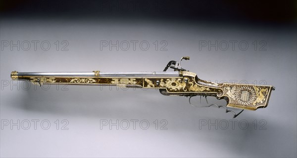 Wheel-Lock Rifle, 1618. Germany, Bavaria (?), 17th century. Steel, brass, walnut stock inlaid with bone, horn and ivory; overall: 77.5 cm (30 1/2 in.); butt: 7 cm (2 3/4 in.); barrel: 49.8 cm (19 5/8 in.); bore: 1.5 cm (9/16 in.).