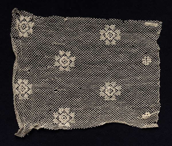 Fragment of a Band with Floral Motif, 18th or early 19th century. Spain, 18th or early 19th century. Needle lace, filet/lacis (knotted ground and darned in one direction); bleached linen (est.); overall: 20 x 23 cm (7 7/8 x 9 1/16 in.).