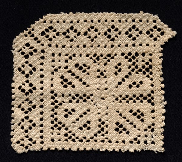 Fragment of a Corner with Floral Motif, 17th-18th century. Spain, 17th-18th century. Needle lace, filet/lacis (knotted ground and darned in two directions); bleached linen (est.); overall: 12.5 x 14.1 cm (4 15/16 x 5 9/16 in.)