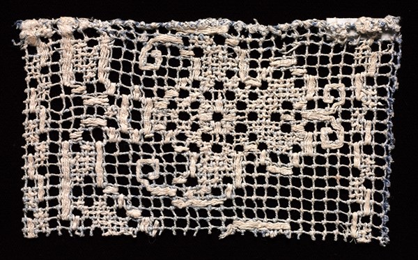 Fragment with a Floral (tendril) Motif, 16th-17th century. Italy, 16th-17th century. Needle lace, filet/lacis (knotted ground and darned in one and two directions); bleached and blue dyed linen (est.); overall: 12.5 x 7.4 cm (4 15/16 x 2 15/16 in.)