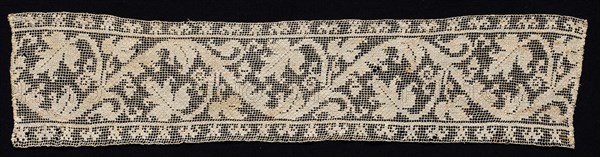 Fragment of a Band with Vine Scroll and Leaves, 16th-17th century. Italy, 16th-17th century. Needle lace, filet/lacis (knotted ground and darned in two directions); bleached linen (est.); overall: 15 x 63.8 cm (5 7/8 x 25 1/8 in.)