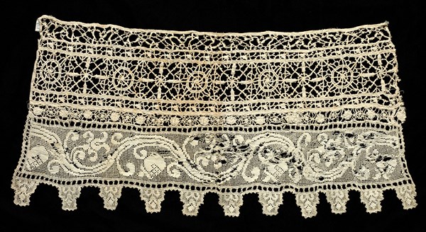 Fragment of a Border with Floral Vine and Geometric Patterns, 16th century. Italy, 16th century. Needle lace, burato (twined ground and darned in two directions) and reticella; bleached linen (est.); overall: 32.9 x 69.3 cm (12 15/16 x 27 5/16 in.)