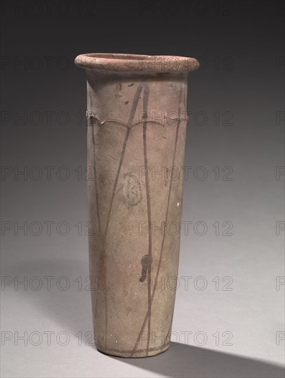 Wavy-Handled Jar, 4000-3000 BC. Egypt, Predynastic Period, Naqada IIa2 period (Dynasty 0) or later. Marl clay ware; diameter: 10.9 cm (4 5/16 in.); diameter of mouth: 8.8 cm (3 7/16 in.); overall: 28.7 cm (11 5/16 in.).