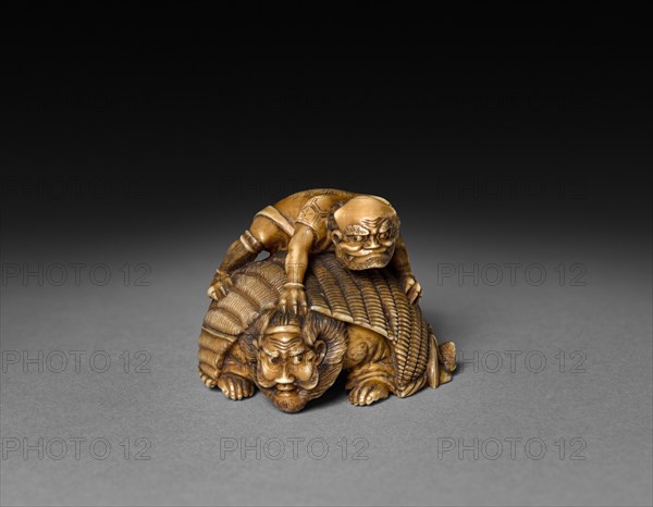 Demon Covering Shoki, 19th century. Japan, Edo Period (1615-1868). Ivory; overall: 3.2 cm (1 1/4 in.).