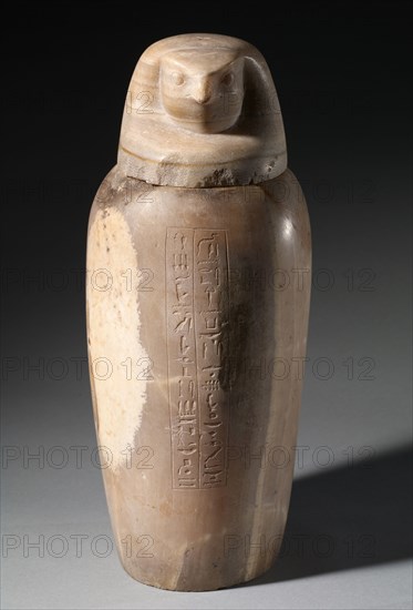 Canopic Jar with Falcon's Head, 664-525 BC. Egypt, Late Period, Dynasty 26. Travertine; diameter: 18.6 cm (7 5/16 in.); diameter of mouth: 10.5 cm (4 1/8 in.); overall: 45.3 cm (17 13/16 in.).