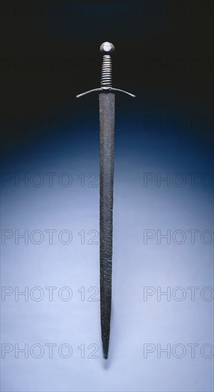 Sword, c. 1400. European, early 15th century. Steel, leather, wire; overall: 85.3 cm (33 9/16 in.); blade: 71.7 cm (28 1/4 in.); quillions: 16.7 cm (6 9/16 in.); grip: 12.7 cm (5 in.).
