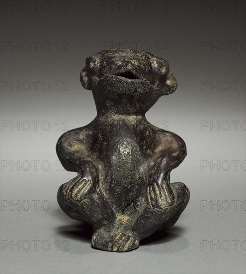 Seated Figure, before 1921. Colombia. Pottery; overall: 14 x 10.2 cm (5 1/2 x 4 in.).