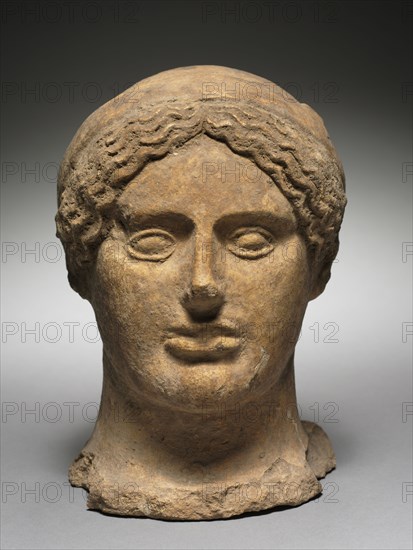 Head of a Woman, 500-475 BC. Italy, Etruscan, 5th Century BC. Terracotta; overall: 20.3 cm (8 in.).