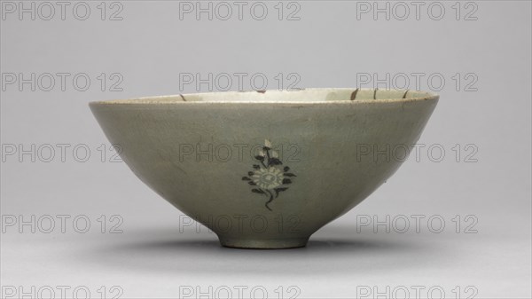 Bowl with Fish and Waves in Relief, 1200s. Korea, Goryeo period (918-1392). Pottery; diameter of base: 3.8 cm (1 1/2 in.); overall: 6.9 x 16.1 cm (2 11/16 x 6 5/16 in.).
