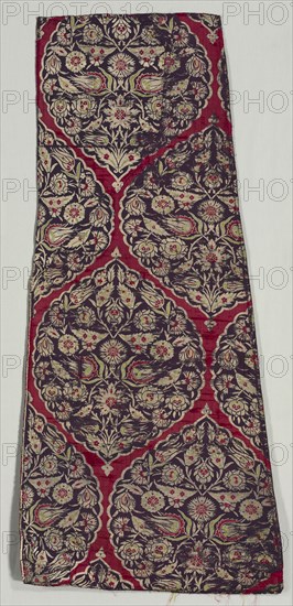 Brocaded silk with foliate medallions from a kaftan, 1525-1575. Turkey, Istanbul, Ottoman period. Lampas: silk and silver-metal thread; overall: 104.7 x 48.3 cm (41 1/4 x 19 in.)