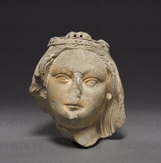Crowned Female Head (Fragment), c. 1400-1420. France, Champagne, 15th century. Limestone; overall: 21.6 x 18.8 x 15.2 cm (8 1/2 x 7 3/8 x 6 in.).