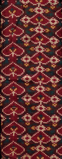 Fragment, 1800s. India, Gujarat, 19th century. Patola (double ikat) weaving; silk; overall: 44.5 x 17.2 cm (17 1/2 x 6 3/4 in.).