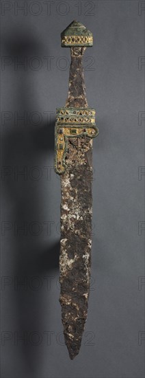 Single-Edged Knife (Scramasax), c. 500-700. Merovingian, Migration period, 6th-7th Century. Iron, brass, gold foil, gold wire, gemstones; overall: 54.3 x 6.4 cm (21 3/8 x 2 1/2 in.)
