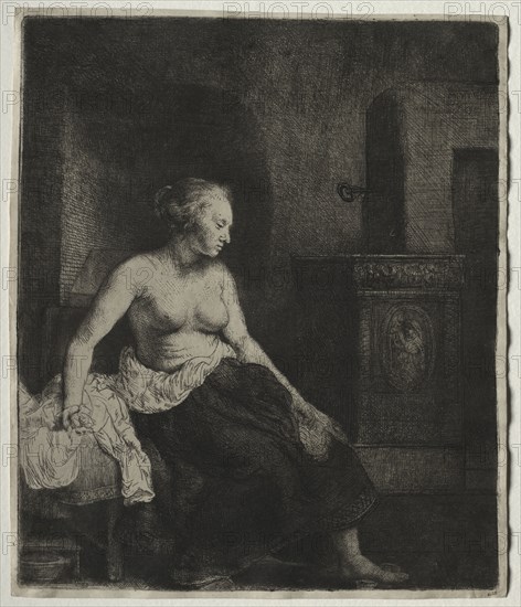 Woman Sitting Half Dressed Beside a Stove, 1658. Rembrandt van Rijn (Dutch, 1606-1669). Etching and drypoint with surface tone; sheet: 23 x 19.5 cm (9 1/16 x 7 11/16 in.); platemark: 22.3 x 18.8 cm (8 3/4 x 7 3/8 in.).
