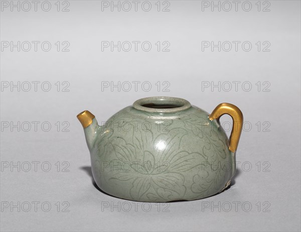 Wine Ewer with Incised Scroll Design, 1100s. Korea, Goryeo period (918-1392). Celadon with incised and carved design; outer diameter: 7.2 cm (2 13/16 in.); overall: 4.2 cm (1 5/8 in.).