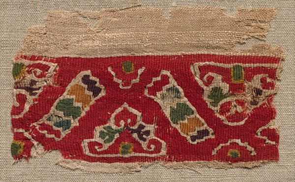 Fragment, with Part of a Clavus, early 800s. Egypt, Abbasid period, early 9th century. Tabby weave, inwoven tapestry ornament; wool and linen; overall: 7.7 x 12.1 cm (3 1/16 x 4 3/4 in.)
