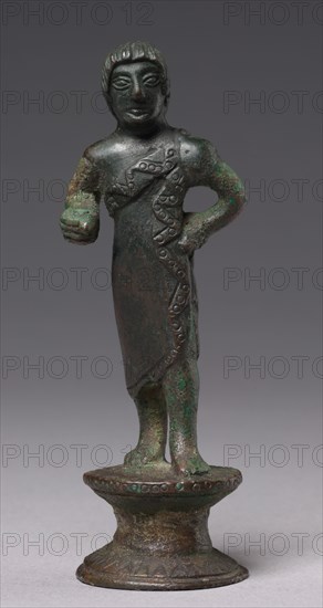 Statuette of a Youth, c. 520-500 BC. Italy, Etruscan, Archaic Period. Bronze; overall: 10.5 cm (4 1/8 in.).