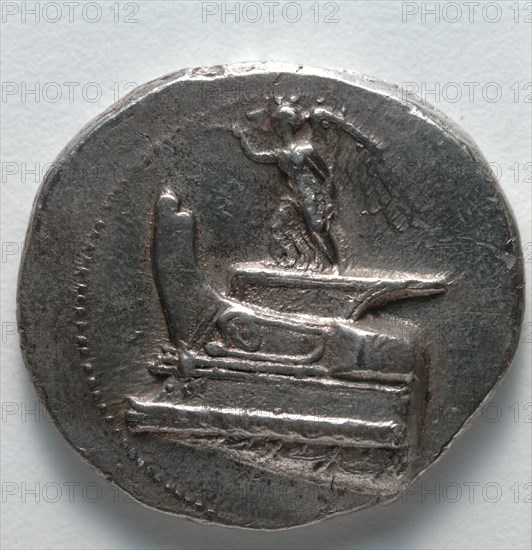 Tetradrachm: Nike Blowing Trumpet, standing on war galley prow (obverse), c. 300-295 BC. Greece, reign of Demetrius Poliorcetes ("The Beseiger"), late 4th century BC. Silver; diameter: 3.1 cm (1 1/4 in.).