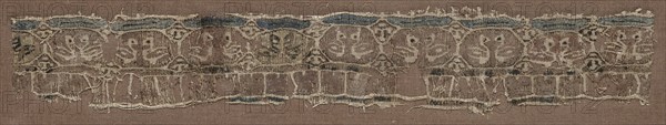Fragment of a Tiraz-Style Textile, 1094 - 1130. Egypt, Fatimid period, Caliphate of al-Musta'li or al'Amir, AH 487-524, 11th-12th Century. Tapestry (originally inwoven in a tabby ground); linen and silk; overall: 4.2 x 28.7 cm (1 5/8 x 11 5/16 in.)