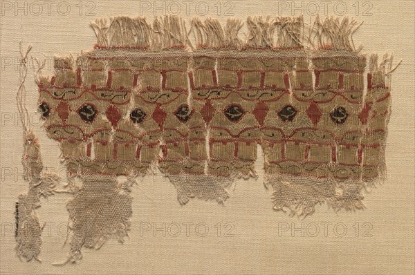 Fragment of a Tiraz-Style Textile, 1101 - 1149. Egypt, Fatimid period, Caliphate of al-Amir or al-Hafiz, AH 495-544, 12th Century. Tabby ground with inwoven tapestry ornament; linen and silk; overall: 8.3 x 12.7 cm (3 1/4 x 5 in.).