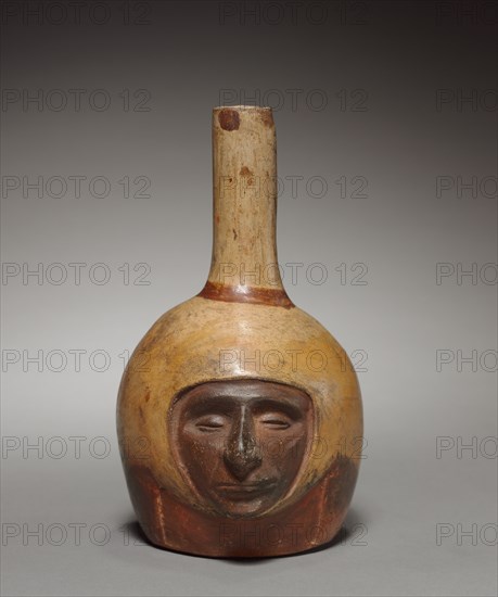 Bottle, before 1930. Peru, Mochica. Pottery; overall: 18.4 x 10.6 x 13.7 cm (7 1/4 x 4 3/16 x 5 3/8 in.).