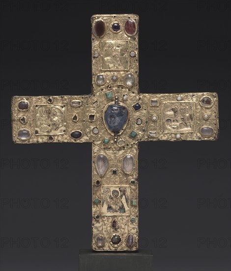 Ceremonial Cross of Countess Gertrude, 1038 or shortly after. Germany, Lower Saxony?, 11th century. Gold: worked in repoussé; cloisonné enamel, intaglio gems, pearls, wood core; overall: 24.2 x 21.6 cm (9 1/2 x 8 1/2 in.).