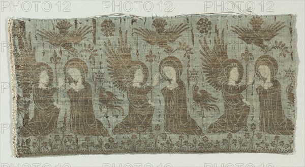 Textile Fragment with the Annunciation, 1370-1400. Italy. Silk with gold thread; lampas weave; overall: 46.4 x 22.9 cm (18 1/4 x 9 in.).